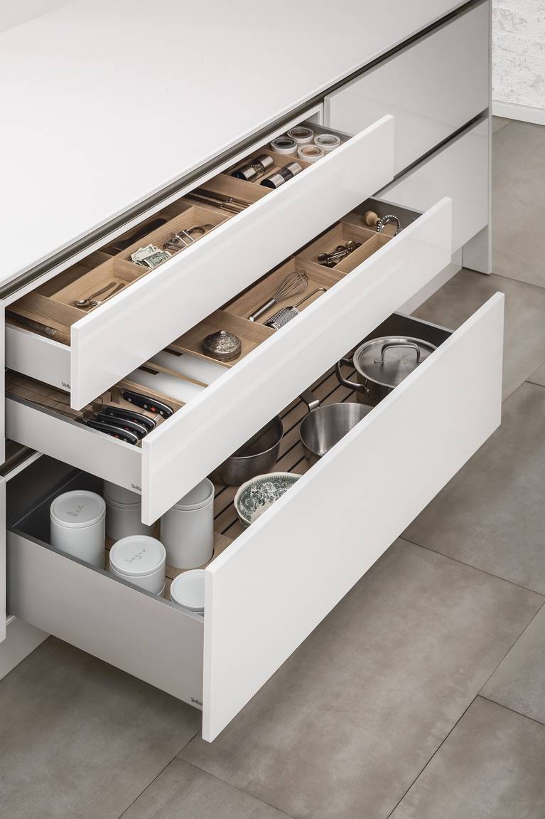 SieMatic kitchen interior accessories for drawers and pull-outs offer versatile organization options.