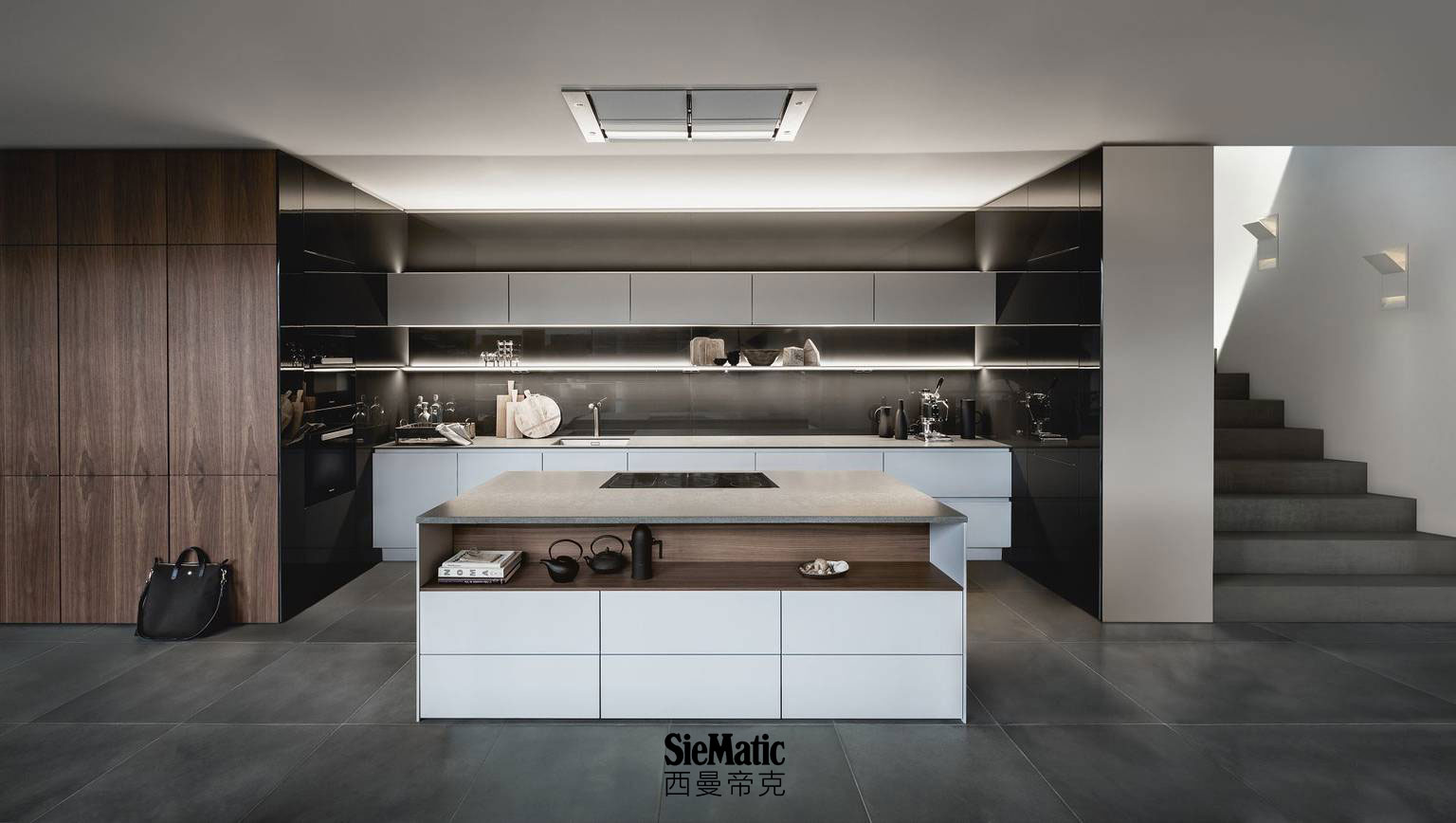 SieMatic Pure S2 SE with kitchen area in grey as well as cabinets in exclusive walnut veneer